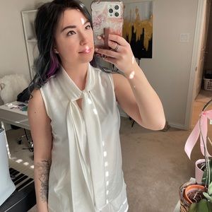 White silk sleeveless blouse